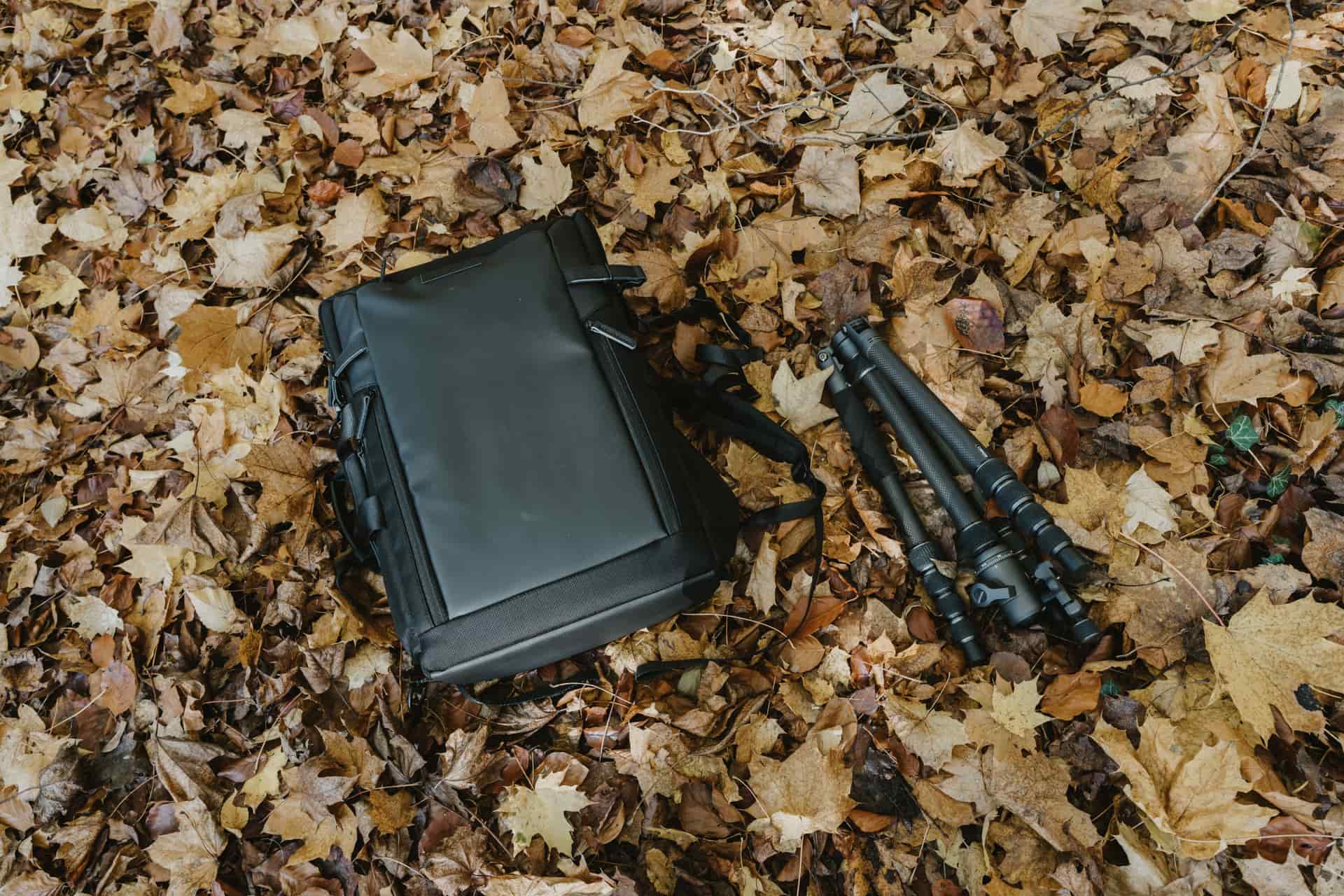 A camera bag and tripod ready for a shoot