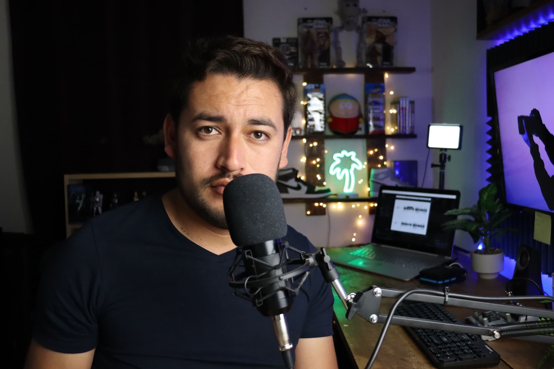 A content creator's desk with a camera and streaming gear
